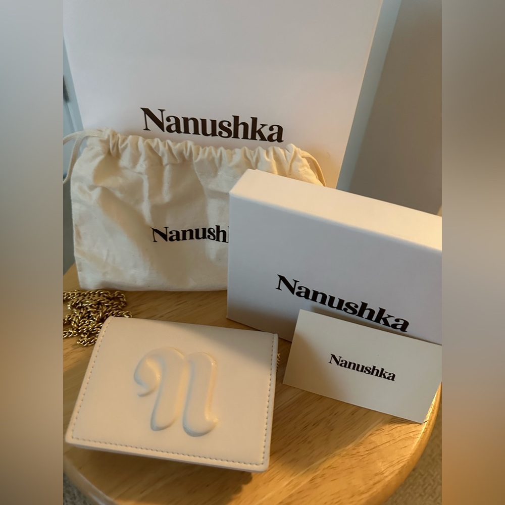 Nanushka Embossed logo chain strap wallet